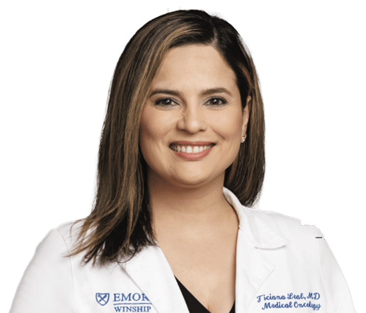 Dr. Ticiana Leal wearing a lab coat.