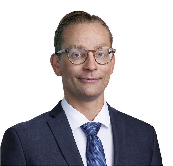 Dr. Wade T. Iams wearing suit and tie.